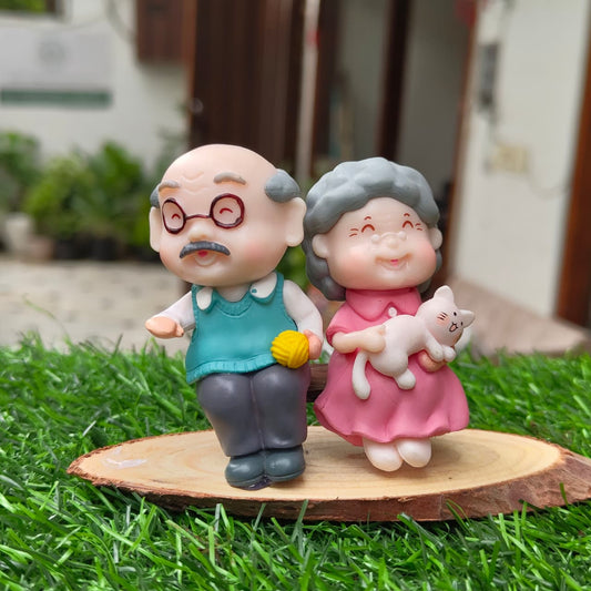 Grandparents playing with Pet miniature